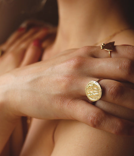 bague médaille dorée