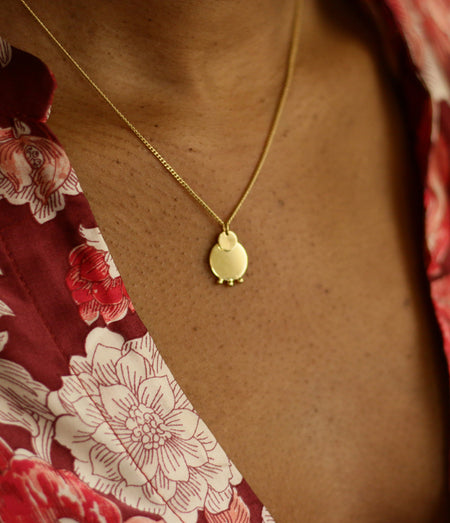 collier graphique doré